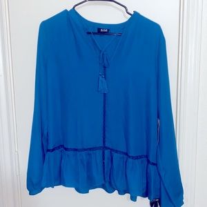 Brand new blouse. Perfect for in the office or a night out